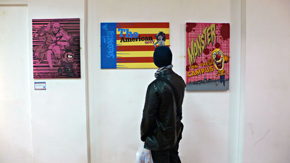 Checking out the art, Brixton Arts co-op, squatted community space in Coldharbour Lane, Brixton, SW9