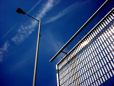 Aircraft trails, billboard, London