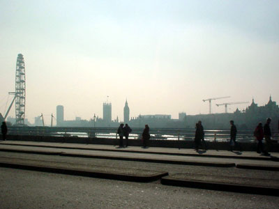 Waterloo Bridge on a hazy London afternoon, looking overParliament and the Millennium Wheel