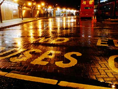 Turnpike Lane bus station in the rain, London