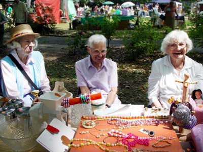 Old ladies and stall, Camden Green Fair and Bike Fest 2003, St James Gardens, Cardington Street NW1, London, June 2003