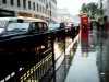 Taxi cabs, telephone boxes and rain