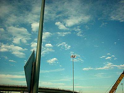 blue sky, signpost and lights