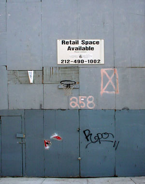 Boarded-up shop and basketball hoop, Elizabeth Street, SoHo, Manhattan, New York
