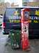 Van, trash can and emergency phone