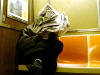 Man and crumpled newspaper, New York, USA