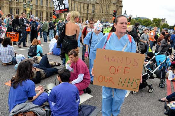 Block the Bridge, UK Uncut action on Westminster Bridge in protest of plans to privatise the NHS. Sunday 9th October 2011, London