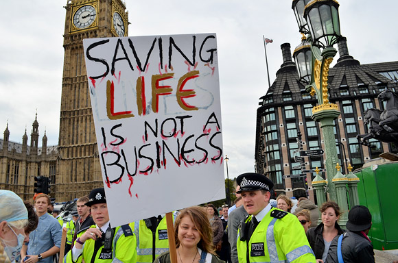 Block the Bridge, UK Uncut action on Westminster Bridge in protest of plans to privatise the NHS. Sunday 9th October 2011, London