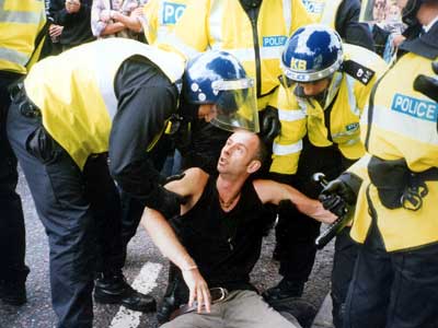 Cop with bongo, Reclaim the Streets, Brighton 