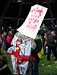 Bloke with banner by stage