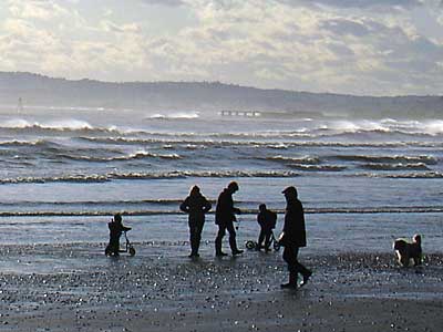 Walking on the beach, Camber Sands, Rye, Sussex, UK
