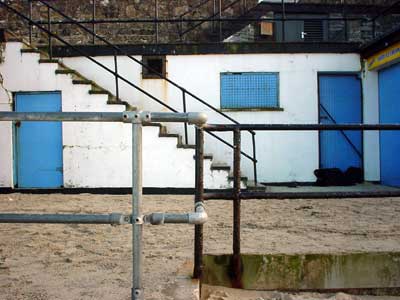 Beach buildings and railings, Porthmeor Beach, St. Ives, Cornwall