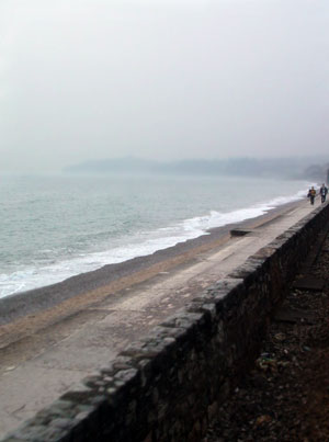 Seaside walkers in the mist, Dawlish Warren, March 2003