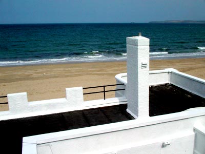 White house, sand, sea and blue sky, Carbis Bay, St Ives Cornwall, March 2003