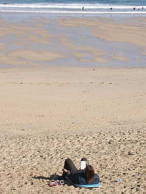 Relaxing on Porthmeor Beach, St Ives, Cornwall, April 2004