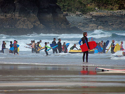 Surfers ahoy! Porthmeor beach, early morning in St Ives, St Ives, Cornwall, August 2005