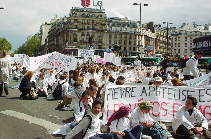 Paris 2001: street photography, shopfronts, protests and signs, May 2001